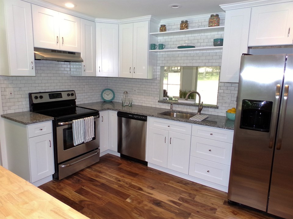 ready for dinner? new appliances, granite counter tops and fresh flooring. upgrades and a new fresh country kitchen.