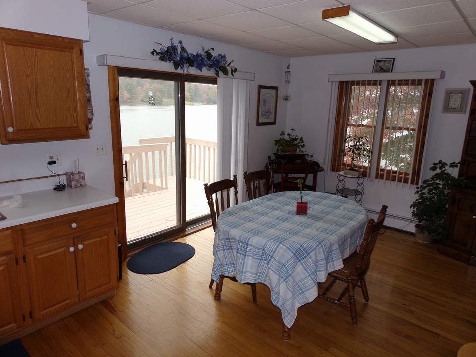 apartment 2 kitchen area walks out onto the deck.