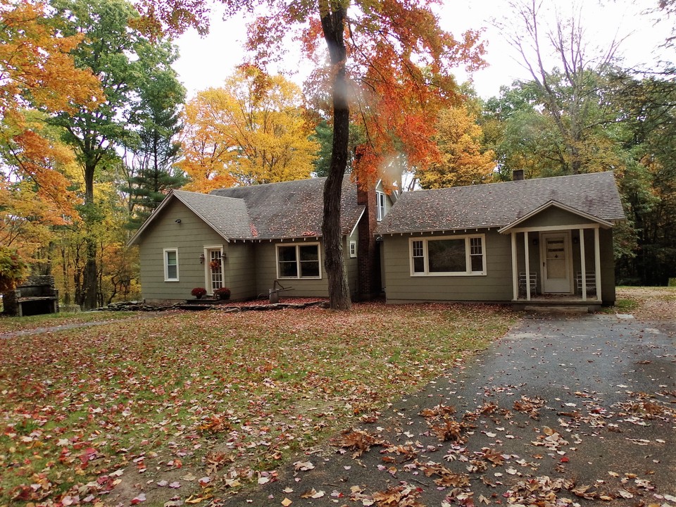 two doors, no problem! want to help defer costs? 
extra weekend rental or year round studio style cottage home that is . 
attached by a breezeway for long weekend guests. separate entrance allows for privacy among guests.
