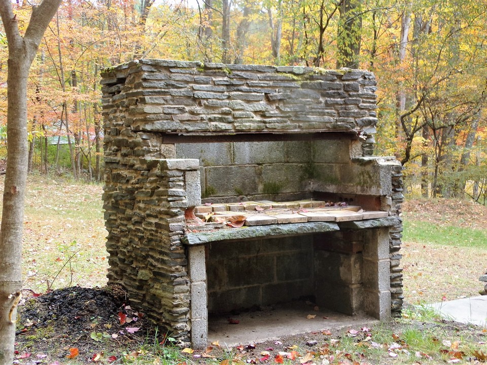 great outdoor fire place. what could be better than a blue stone outdoor fireplace.