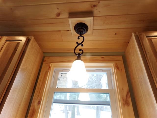 interior refreshed! fresh woodworking, vaulted ceilings and upgraded light fixtures warm the rooms with winter light and open to the fresh air in summer.