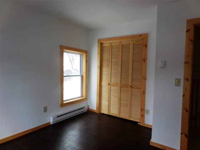 bedrooms fresh paint, closet space and new windows make the room warm and cozy.