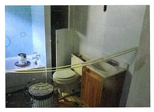 bathroom heated by kerosine the bathroom was just plan nasty. flooring was missing and the vanity was to big for the space allowed.