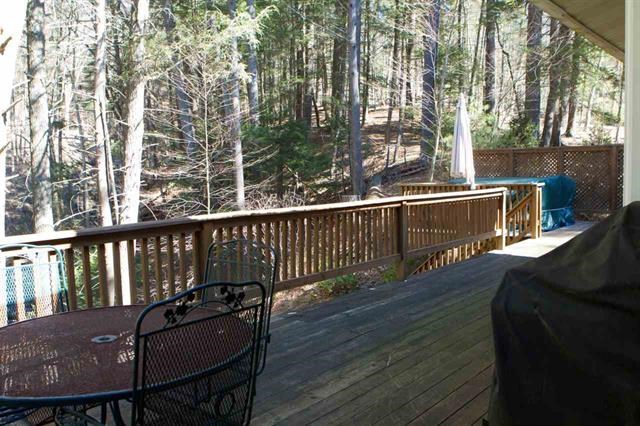 outdoor living plenty of decking that over looks that cool, green and shady area behind your home. listen to the water and it wanders along that mountain path. relax now and breath!