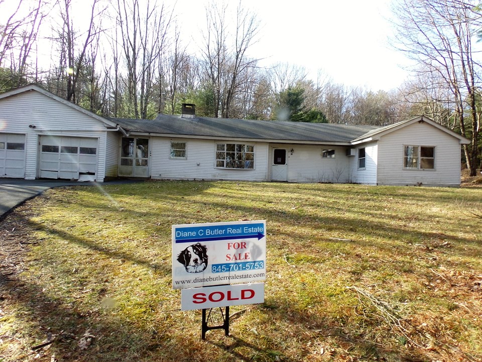 help is on the way! even the brady bunch couldn't have made a sunshine day out of this exterior